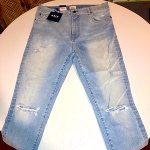New light washed distressed jeans
